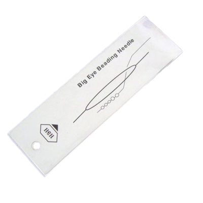 Embalagem branca de agulha de olho grande com ilustrações e texto