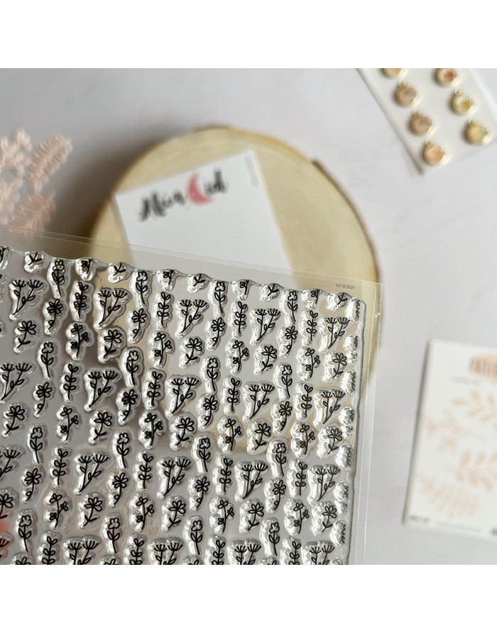 Autocolantes transparentes com desenhos florais pequenos em preto