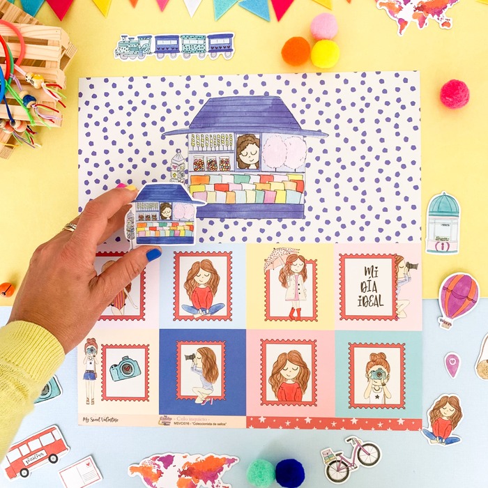 Conjunto colorido de papelaria com desenhos de menina, banca de livros, carro vermelho e bicicleta, fundo amarelo.