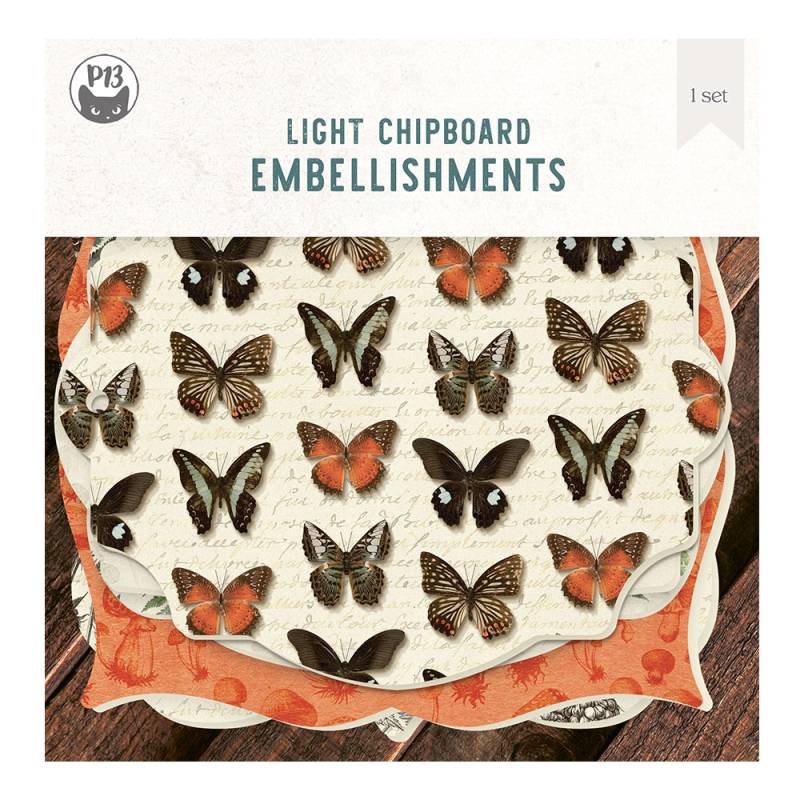 Conjunto de adornos em chipboard com padrão de borboletas coloridas sobre fundo decorativo.