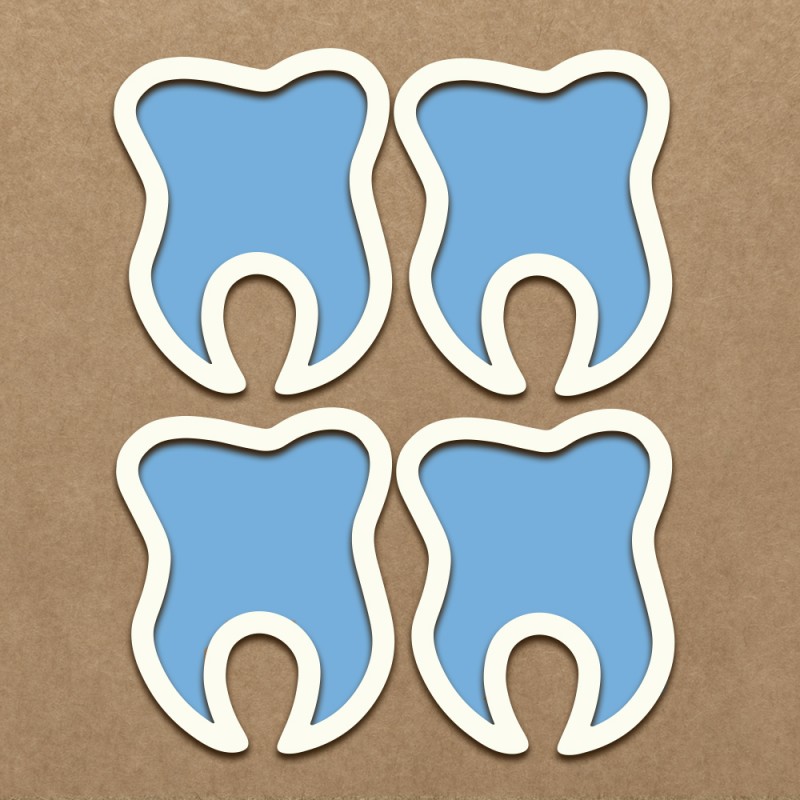 Quatro moldes em forma de dente com borda branca e interior azul claro