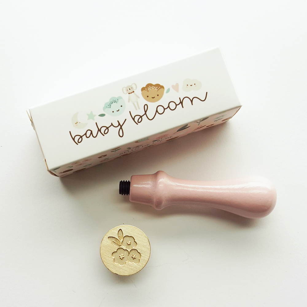 Carimbo com símbolo de flores e embalagem baby bloom