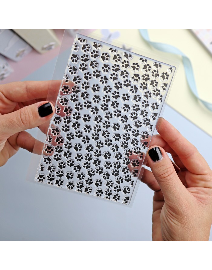 Carimbo transparente com padrão de patas de animal