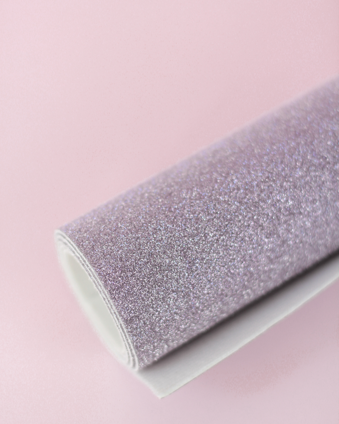 Rolo de tecido com textura glitter prateada