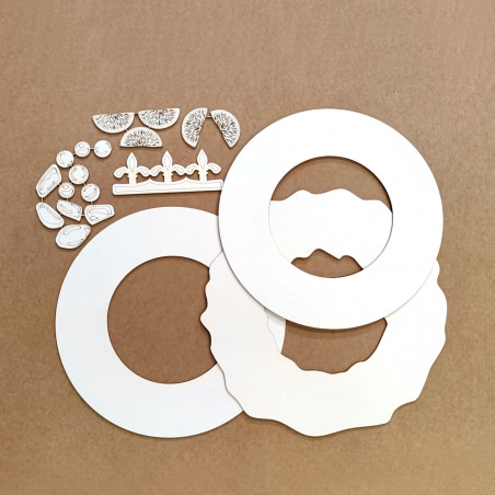 Conjunto de moldes circulares brancos em papel sobre fundo castanho