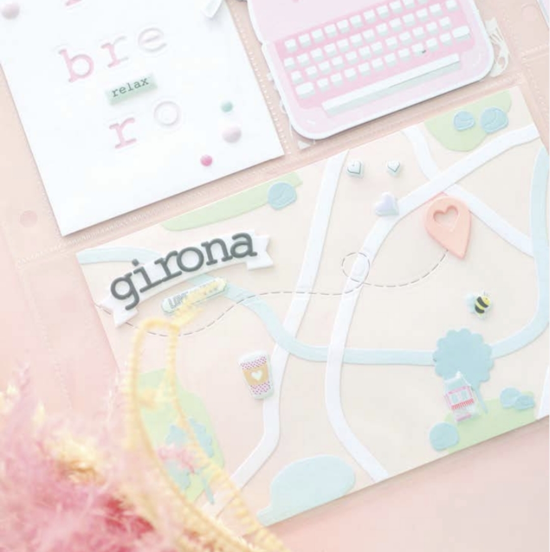 mapa estilizado com palavras girona e relax e objetos decorativos em tons pastéis