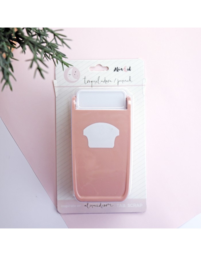 raspador de plástico cor-de-rosa em embalagem com texto