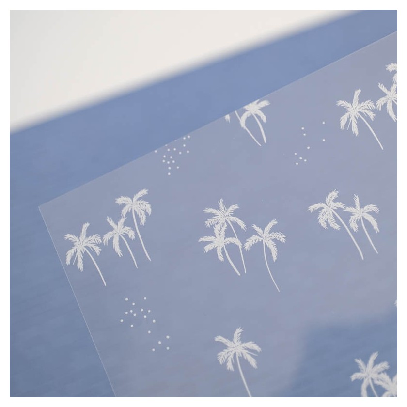 Folha transparente com padrão de palmeiras e estrelas brancas