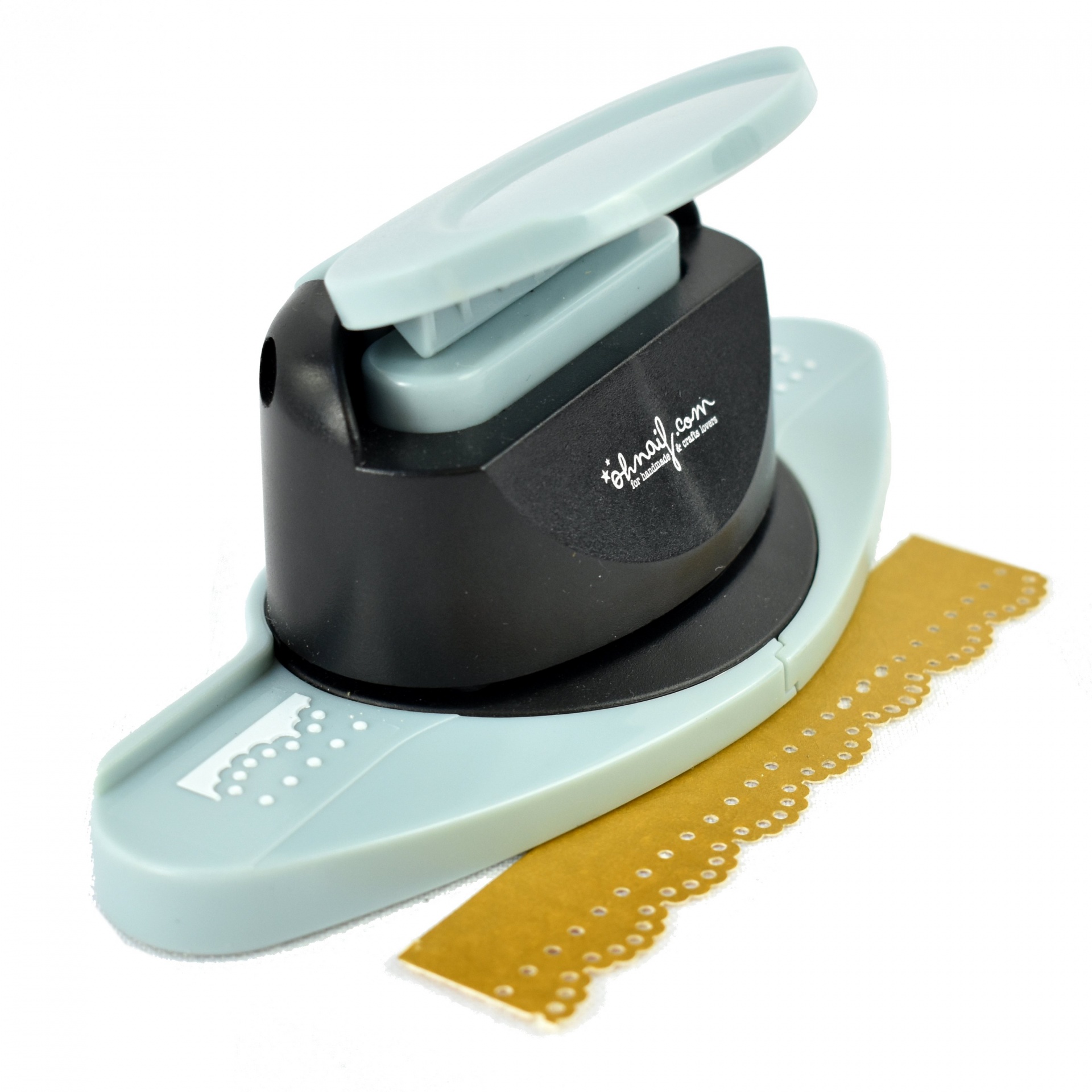 Perfurador de papel azul e preto com padrão recortado e papel dourado