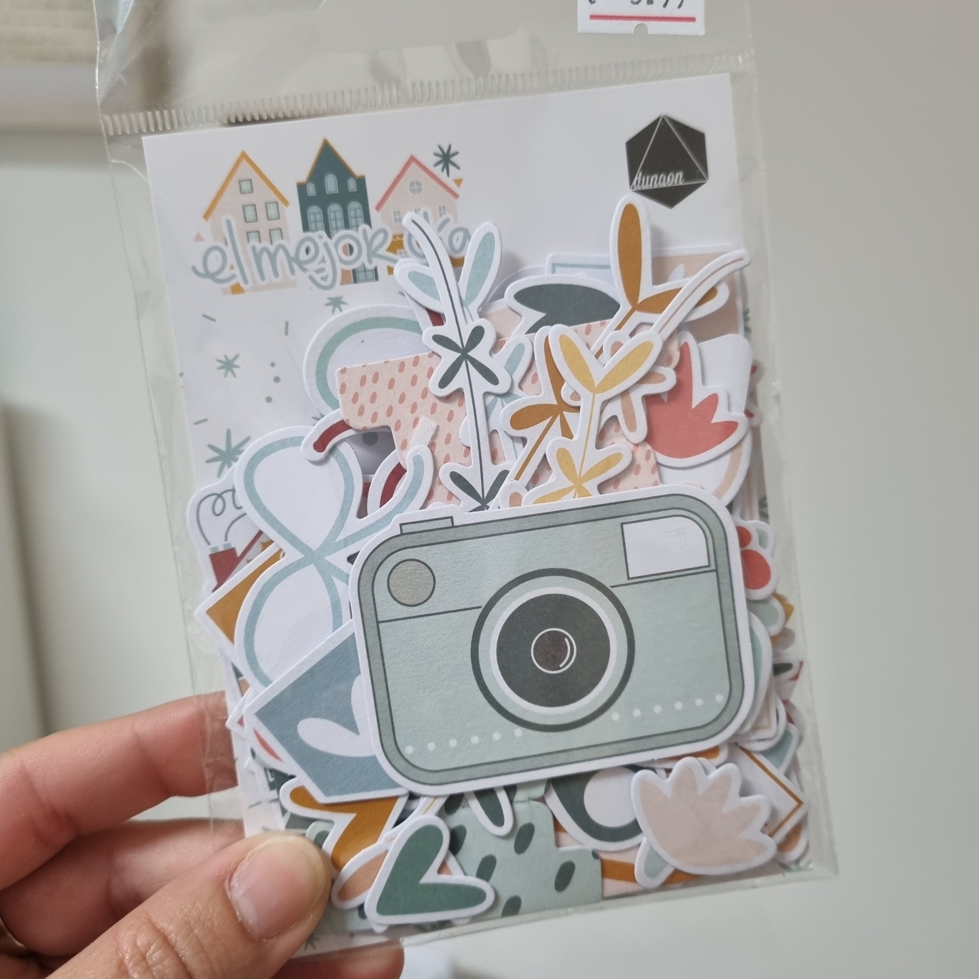 Pacote de autocolantes coloridos de papel com vários desenhos e texto el mejor