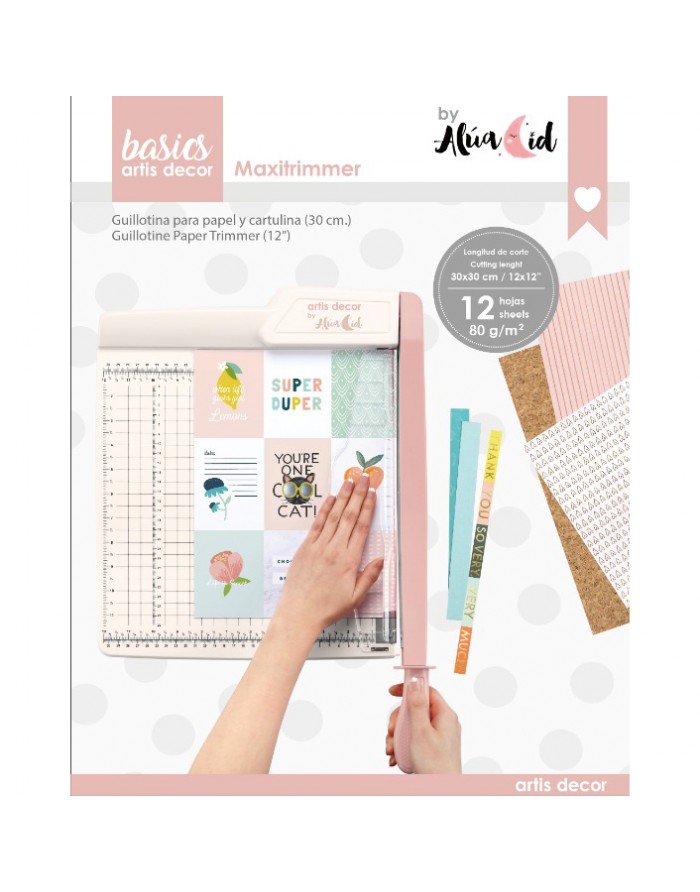 Guilhotina para papel e cartolina com base branca e lâmina rosa, com folhas ilustradas e coloridas em fundo branco.