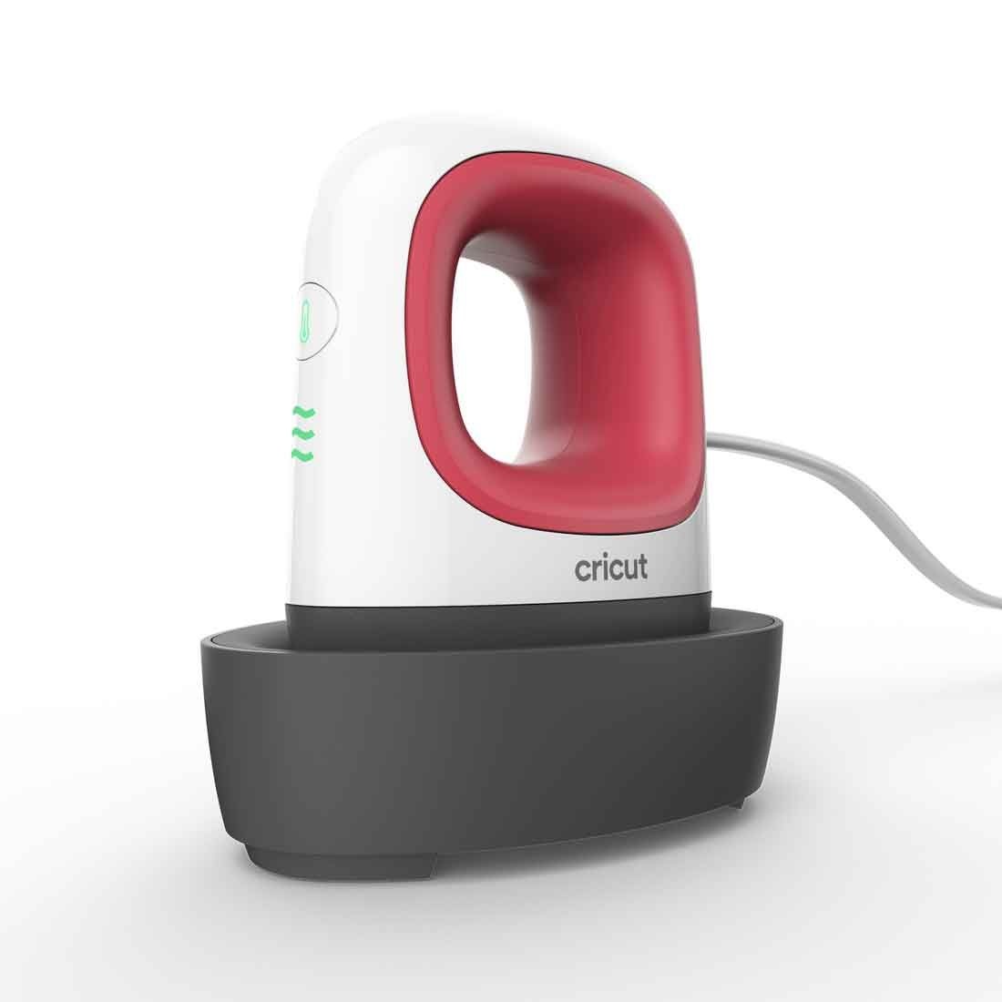 Ferro de engomar compacto Cricut com pega vermelha e base preta
