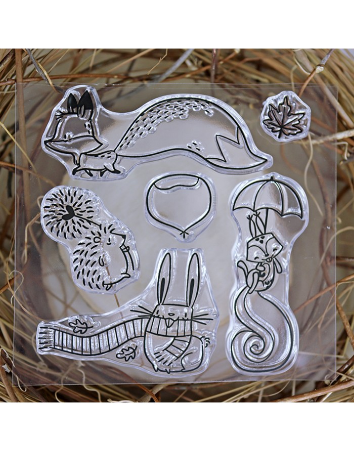 Conjunto de carimbos transparentes com desenhos de animais e objetos em preto e branco