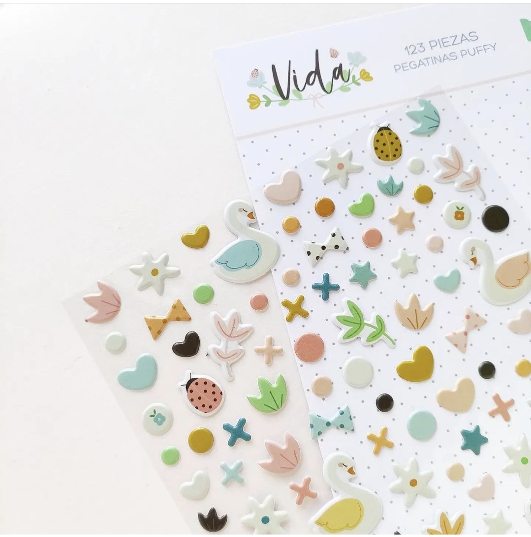 Autocolantes Puffy coloridos com vários desenhos em folha marcada como Vida