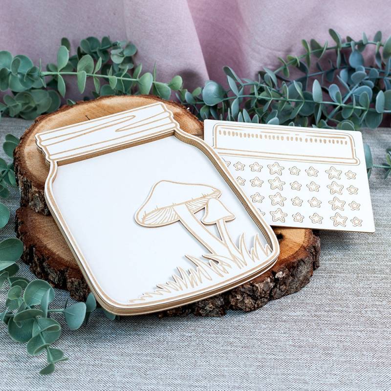 Placa decorativa em forma de frasco com cogumelos e placa com estrelas