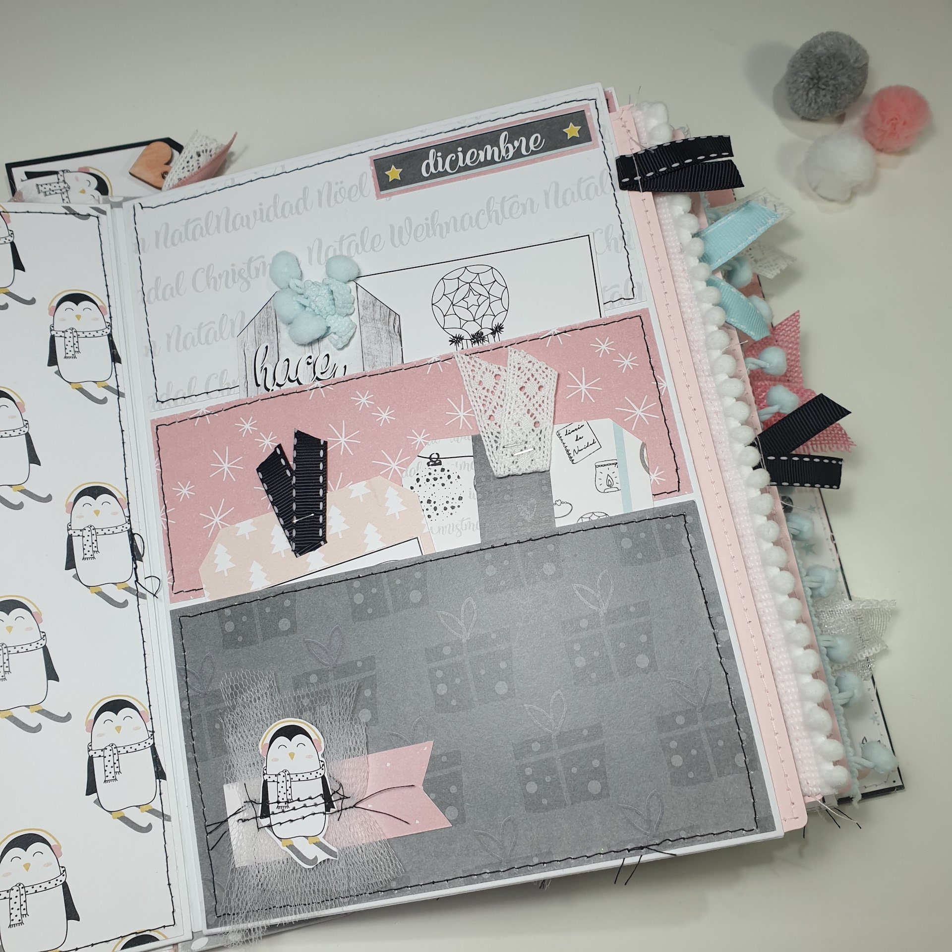 Livro artesanal decorativo com padrões festivos em tons pastel e abas coloridas