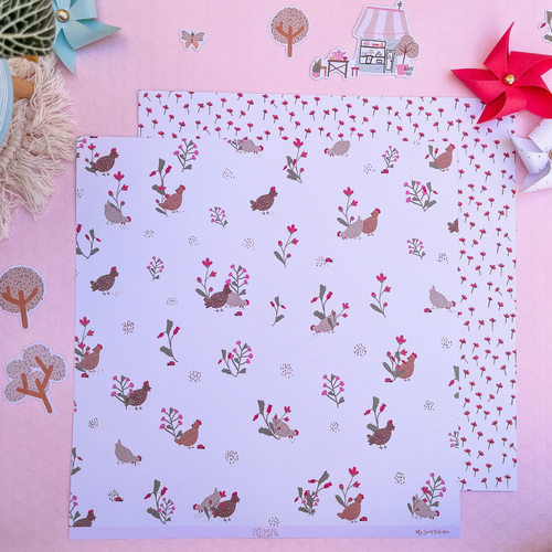 Folhas de papel decorativo com padrão de galinhas e flores e elementos decorativos ao redor