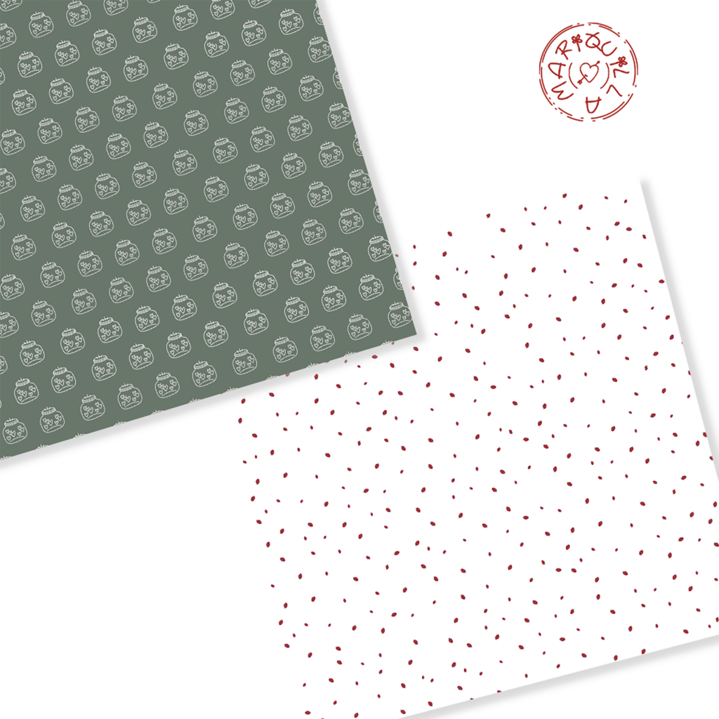Dois papéis de embrulho com padrões decorativos, um cinza esverdeado com figuras brancas e outro branco com pontos vermelhos e carimbo.