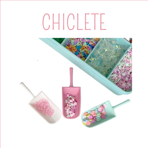 Recipiente e pequenas pás com confetis coloridos