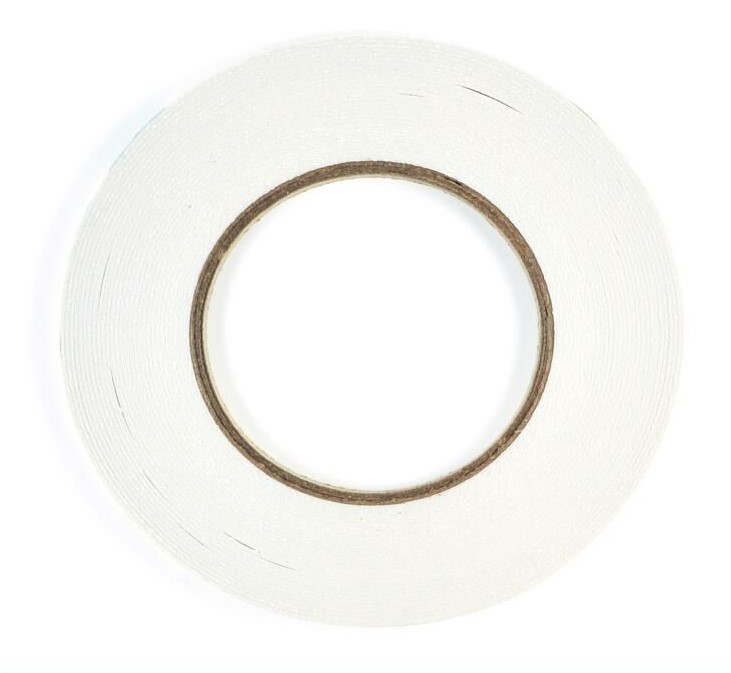 Rolo de fita dupla face branca vista de cima