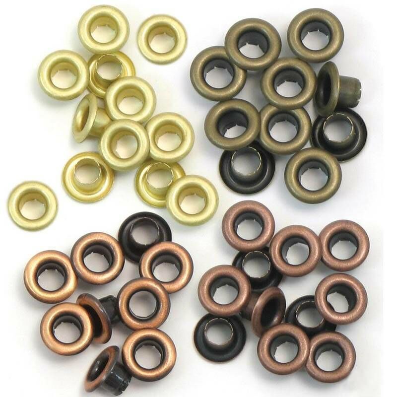 Ilhós metálicos circulares em dourado, bronze e preto sobre fundo branco