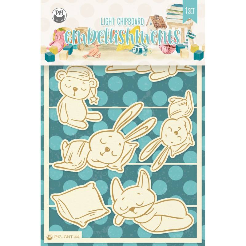 Embellishments em chipboard claro com figuras de animais e almofadas em fundo azul