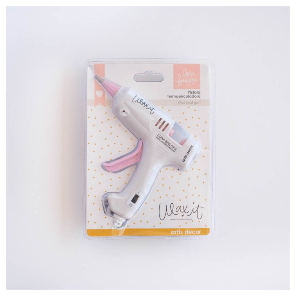 Pistola termocoladora branca e rosa em embalagem transparente com cartão decorado.