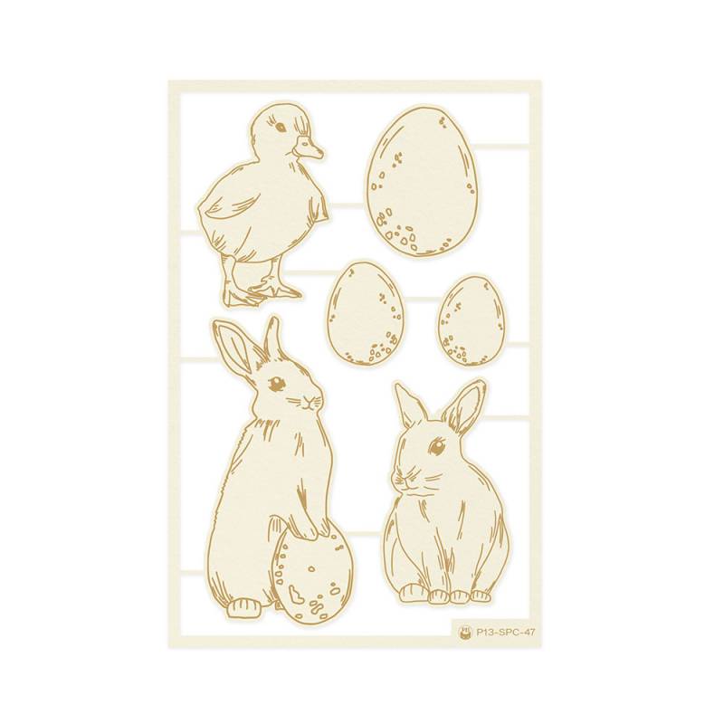 Molde com recortes de coelhos e ovos em silicone ou plástico bege