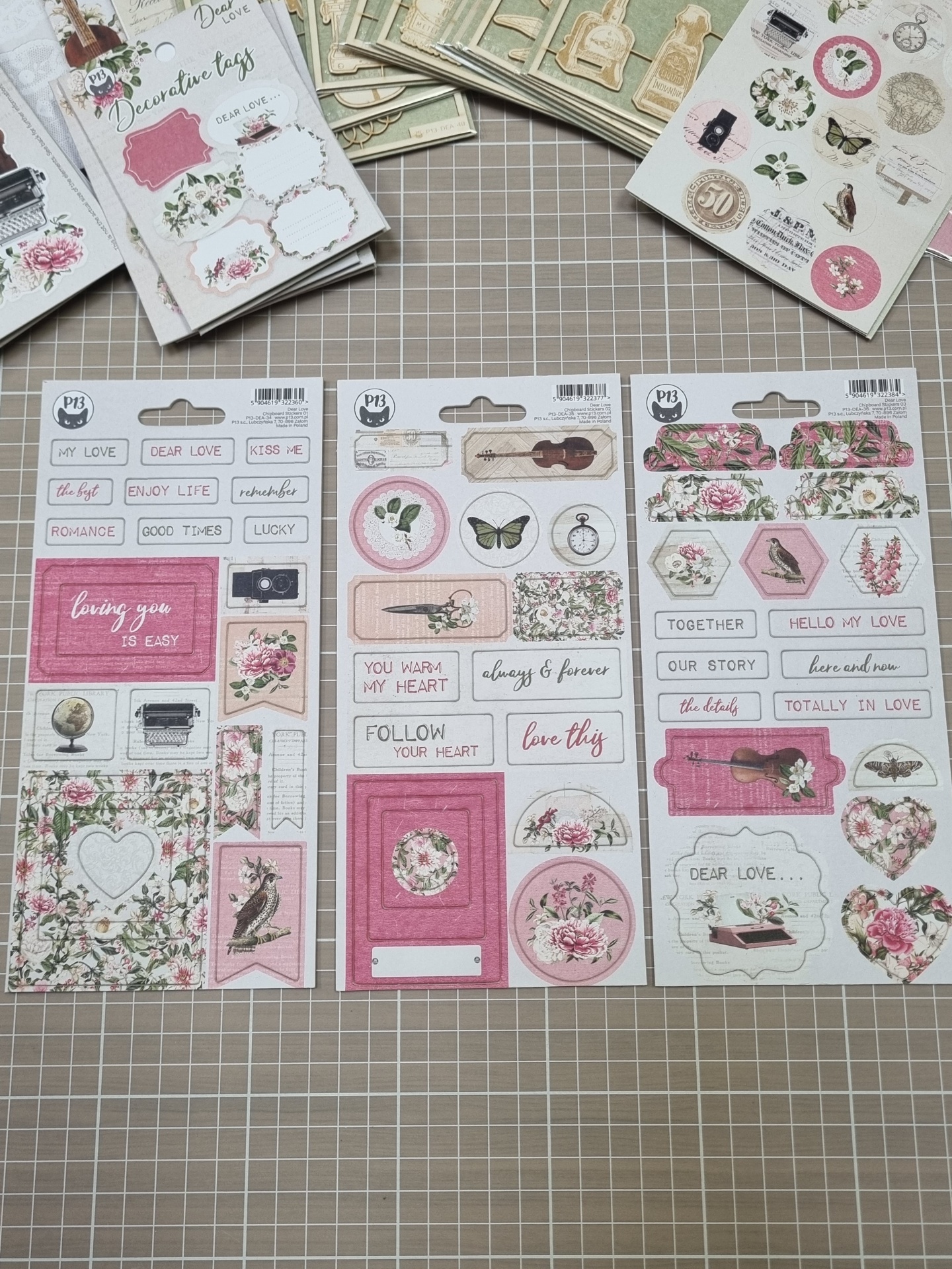 Folhas de autocolantes decorativos com temas florais e frases em inglês
