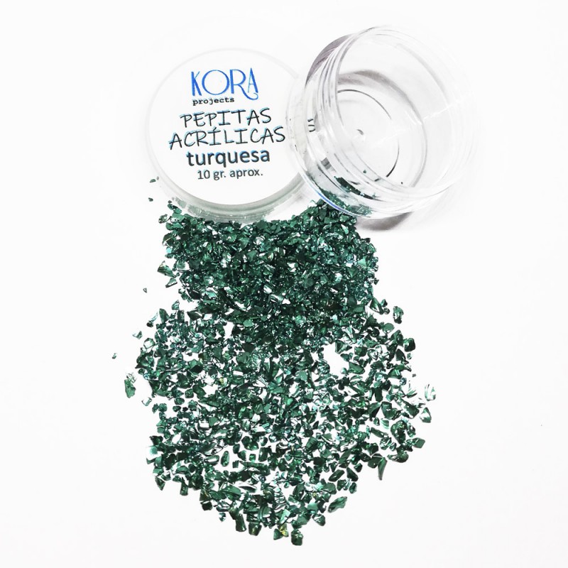 Frasco com pepitas acrílicas turquesa da KORA PROGETS e pepitas espalhadas
