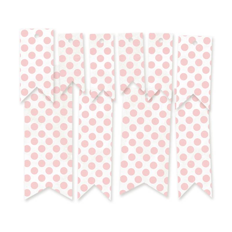 Fitas decorativas com bolinhas cor-de-rosa em fundo branco