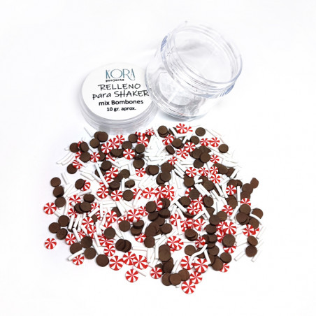 Frasco aberto com confeitos pequenos castanhos e vermelho e branco tipo doce de menta