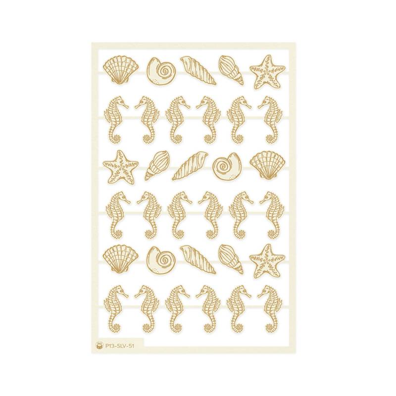 Autocolantes dourados de cavalos-marinhos, estrelas-do-mar e conchas em folha branca