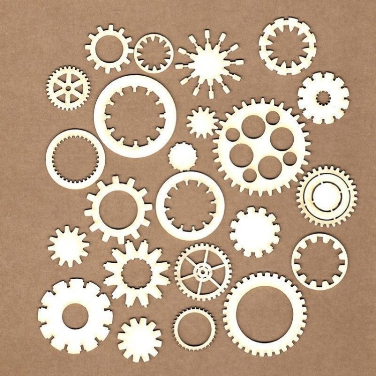 Engrenagens de madeira clara em vários tamanhos e formatos sobre fundo castanho
