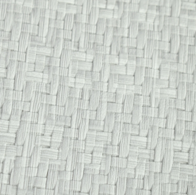 Pano branco com padrão geométrico em relevo