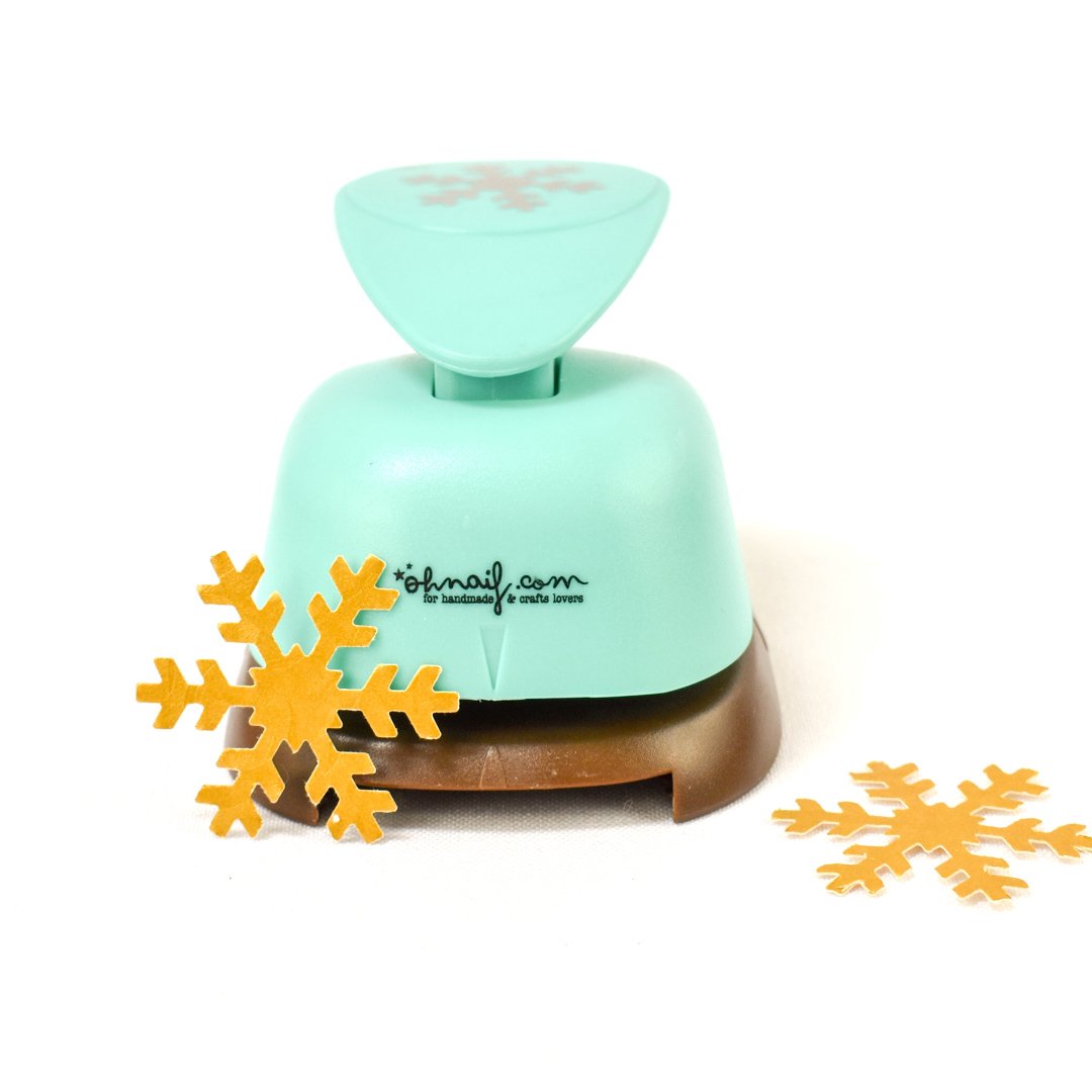Furador de papel azul claro com recorte de floco de neve amarelo