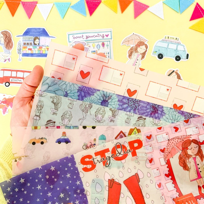 Folhas de papel decorativo translúcido com padrões variados coloridos