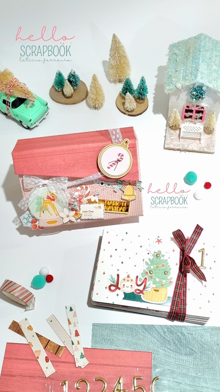 Artigos de scrapbook natalícios com árvores, cartões e decoração em papel