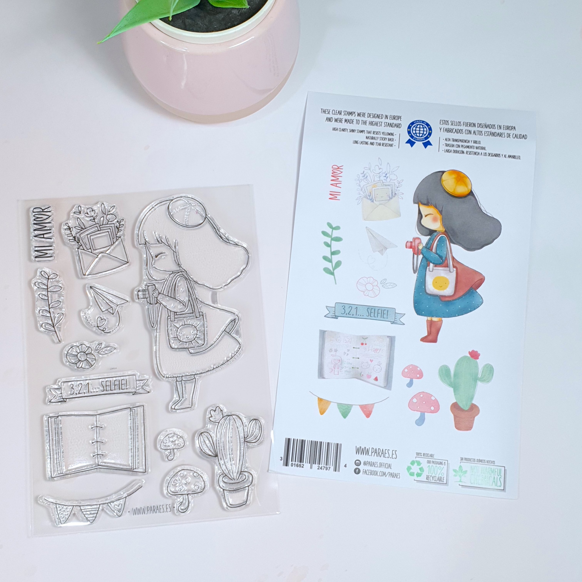 Conjunto de carimbos com figuras de menina e plantas, papel ilustrado e vaso rosa com planta