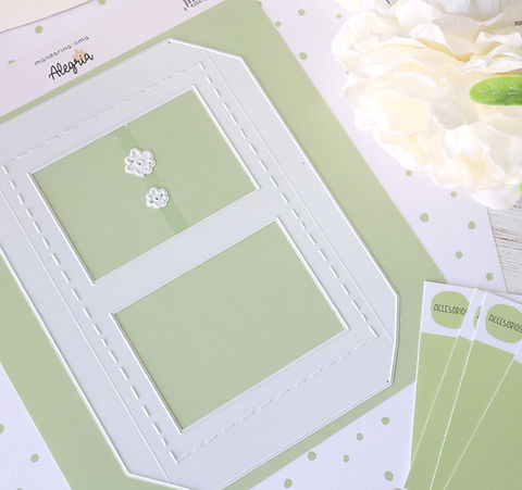 Moldes de corte metálicos brancos para artesanato sobre fundo verde