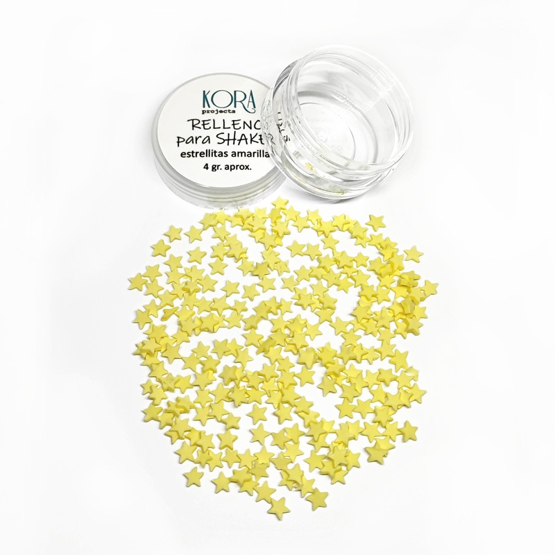 Pequeno recipiente com estrelas amarelas e tampa com texto da marca KORA.