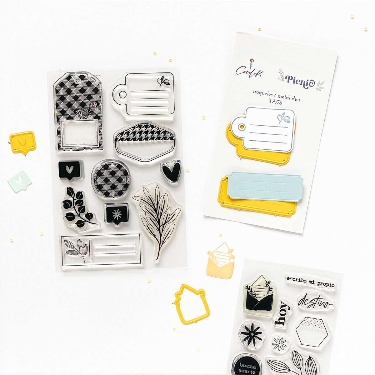 Carimbos de silicone e etiquetas de papel em cores preto, branco, amarelo e azul