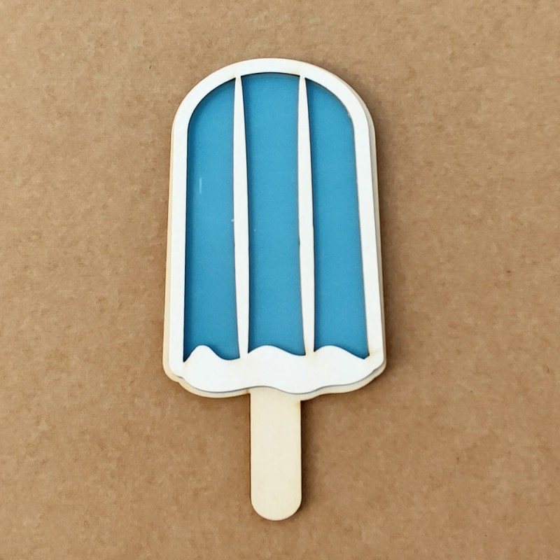Objeto decorativo em forma de gelado azul com contorno branco