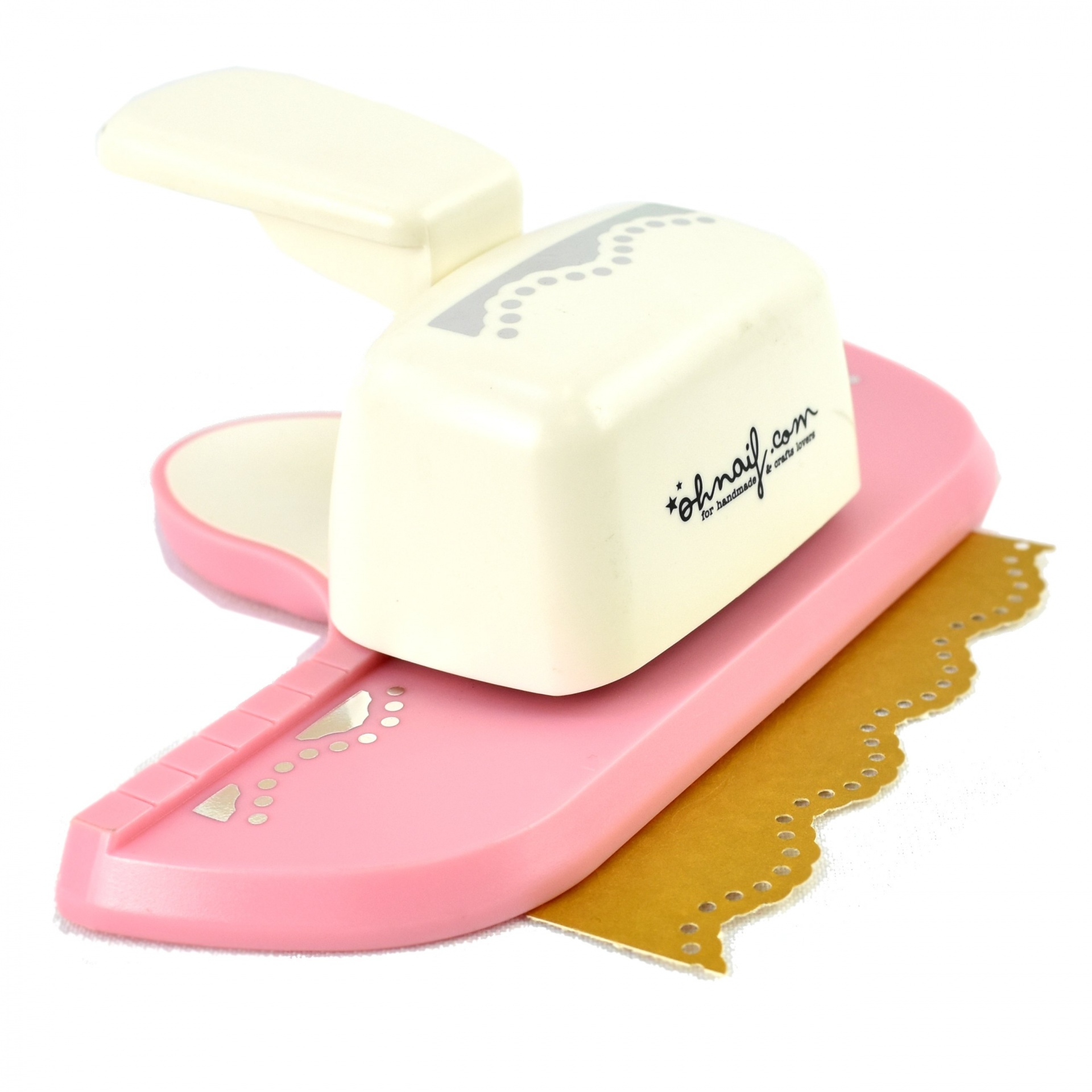 Furador de papel manual branco e rosa com padrão decorativo