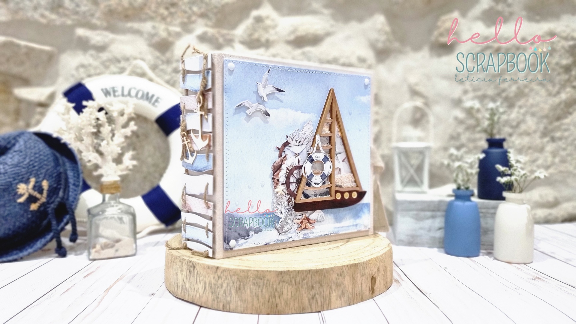 álbum de fotos náutico com barcos e conchas