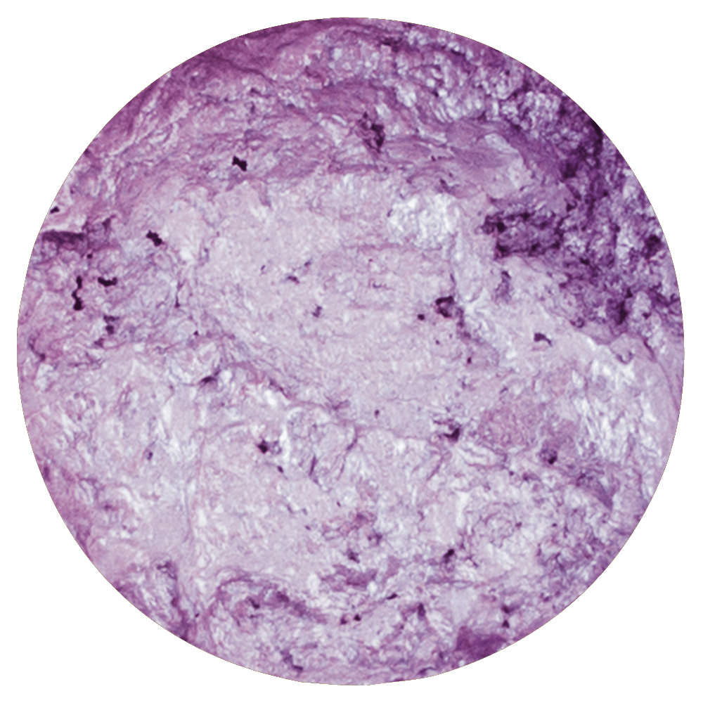 Superfície circular violeta com textura rugosa irregular