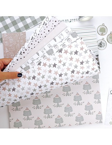 Papel decorativo com vários padrões em tons pastel e preto e branco