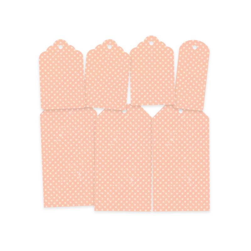 Etiquetas cor-de-rosa com bolinhas brancas e orifício para pendurar