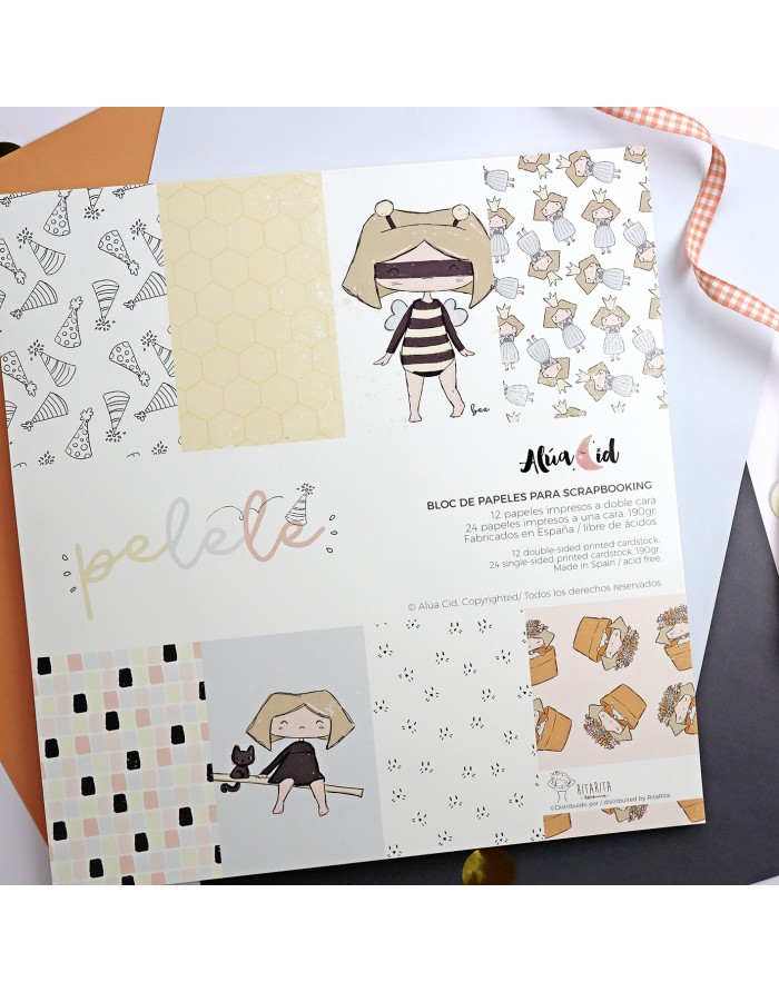 Bloco de papéis para scrapbooking com desenhos infantis e padrões coloridos