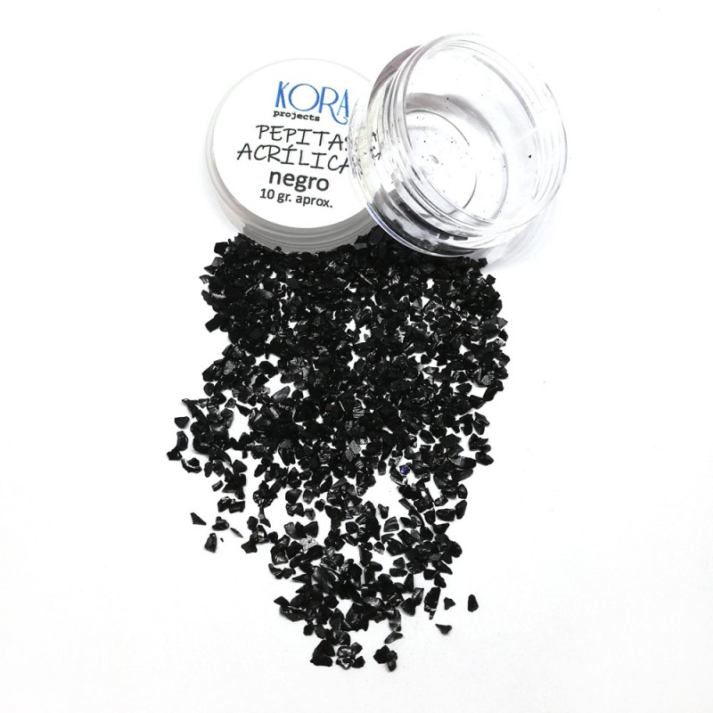 Recipiente transparente com partículas pretas de acrílico